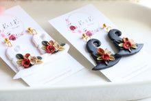 Load image into Gallery viewer, Witch Hat Polymer Clay Earrings – Handmade Halloween Earrings | Spooky Cute Statement Jewelry | KeandKi Designs (White Flower)