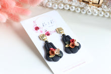Load image into Gallery viewer, Pumpkin Floral Polymer Clay Earrings – Handmade Autumn Halloween Earrings | Fall Floral Jewelry | KeandKi Designs ( Tri color Black Red teracotta and beige Floral )