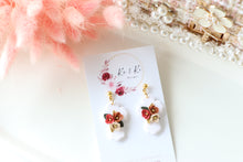 Load image into Gallery viewer, Cross Floral Polymer Clay Earrings – Handmade Floral Statement Earrings | Christian Jewelry | KeandKi Designs ( White Florals )
