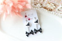 Load image into Gallery viewer, Bat and Bone Polymer Clay Earrings – Handmade Halloween Earrings | Spooky Gothic Statement Jewelry | KeandKi Designs