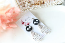 Load image into Gallery viewer, Tiny Skull Head & Steel Skeletal Hand Dangle Earrings – Handmade Gothic Halloween Jewelry | Polymer Clay Skull Earrings | KeandKi Designs