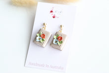 Load image into Gallery viewer, Tan Floral Book Earrings