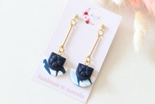 Load image into Gallery viewer, blue_flower_cup_dangle_handmade_earrings_left_side_view
