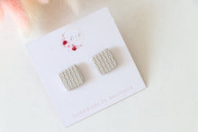 Load image into Gallery viewer, frost_white_square_stud_handmade_earrings_side_view
