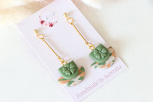 Load image into Gallery viewer, green_flower_cup_dangle_earrings_front_near_view