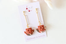 Load image into Gallery viewer, orange_brown_floral_cup_dangle_handmade_earrings_front_view