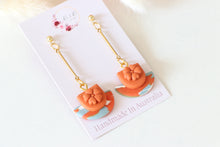 Load image into Gallery viewer, orange_flower_cup_dangle_handmade_earrings_front_view
