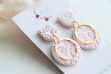 Load image into Gallery viewer, pink_circle_charm_textured_dangle_earrings_handmade_up_view