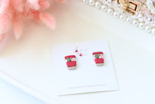 Load image into Gallery viewer, Candy_Cane_Christmas_Cup_Dangle_Earrings_red_handmade_top_view
