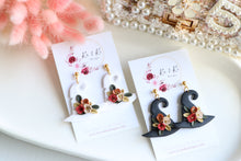 Load image into Gallery viewer, Witch Hat Polymer Clay Earrings – Handmade Halloween Earrings | Spooky Cute Statement Jewelry | KeandKi Designs (White Flower)
