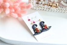 Load image into Gallery viewer, Witch Hat Polymer Clay Earrings – Handmade Halloween Earrings | Spooky Cute Statement Jewelry | KeandKi Designs (Black Flower)
