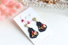 Load image into Gallery viewer, Pumpkin Floral Polymer Clay Earrings – Handmade Autumn Halloween Earrings | Fall Floral Jewelry | KeandKi Designs ( Tri color Black Red teracotta and beige Floral )
