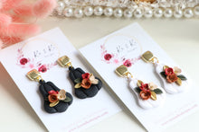 Load image into Gallery viewer, Pumpkin Floral Polymer Clay Earrings – Handmade Autumn Halloween Earrings | Fall Floral Jewelry | KeandKi Designs ( Tri color Black Red teracotta and beige Floral )
