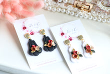 Load image into Gallery viewer, Pumpkin Floral Polymer Clay Earrings – Handmade Autumn Halloween Earrings | Fall Floral Jewelry | KeandKi Designs ( Tri color Black Red teracotta and beige Floral )
