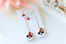 Load image into Gallery viewer, Floral Tiny Skull Polymer Clay Earrings – Mini Gothic Floral Earrings | Handmade Spooky Cute Jewelry | KeandKi Designs (White)
