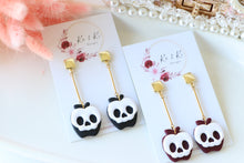 Load image into Gallery viewer, Apple Skull Polymer Clay Earrings – Poison Apple Halloween Earrings | Handmade Spooky Cute Jewelry | KeandKi Designs (Marroon)
