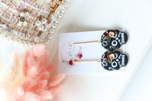 Load image into Gallery viewer, Floral Embossed Skull Floral Dangle Polymer Clay Earrings – Handmade Gothic Floral Earrings | Spooky Elegant Halloween Jewelry | KeandKi Designs
