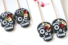 Load image into Gallery viewer, Embossed Skull Floral Dangle Polymer Clay Earrings – Handmade Gothic Floral Earrings | Spooky Elegant Halloween Jewelry | KeandKi Designs
