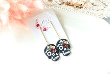 Load image into Gallery viewer, Embossed Skull Floral Dangle Polymer Clay Earrings – Handmade Gothic Floral Earrings | Spooky Elegant Halloween Jewelry | KeandKi Designs
