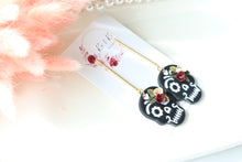 Load image into Gallery viewer, Embossed Skull Floral Dangle Polymer Clay Earrings – Handmade Gothic Floral Earrings | Spooky Elegant Halloween Jewelry | KeandKi Designs
