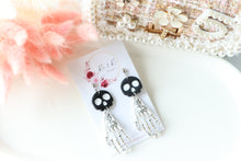 Load image into Gallery viewer, Tiny Skull Head &amp; Steel Skeletal Hand Dangle Earrings – Handmade Gothic Halloween Jewelry | Polymer Clay Skull Earrings | KeandKi Designs
