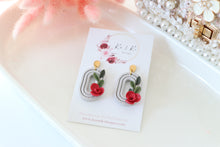 Load image into Gallery viewer, circular_disc_flower_dangle_earrings_handmade_left_side_view
