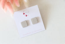 Load image into Gallery viewer, frost_white_square_stud_handmade_earrings_top_view
