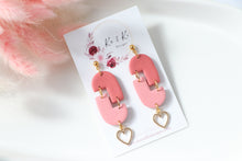 Load image into Gallery viewer, pink_geometric_arch_dangle_earrings_front_top_view_
