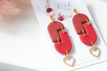 Load image into Gallery viewer, red_geometric_arch_dangle_earrings_front_near_view_
