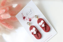 Load image into Gallery viewer, ribbon_bow_heart_dangle_handmade_earrings_left_side_view
